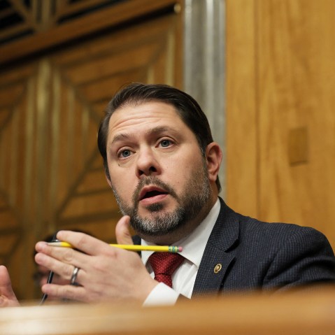 Ruben Gallego speaks while holding a pencil.
