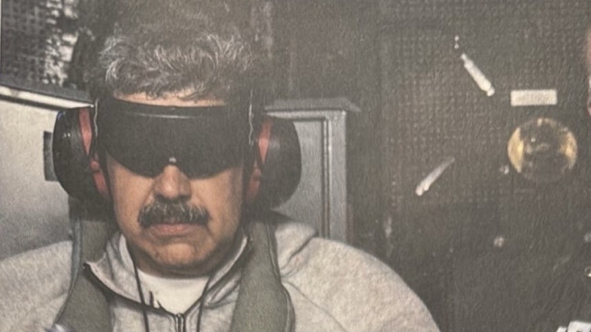 A person blindfolded.