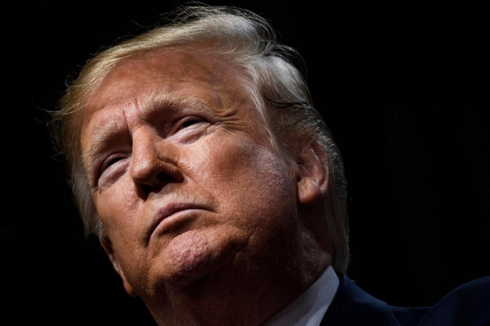 A close-up of Donald Trump looking stoic.