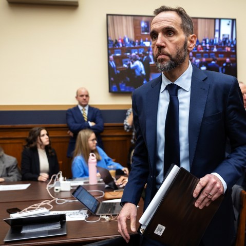 Jack Smith walks toward the desk after a break during his testimony.