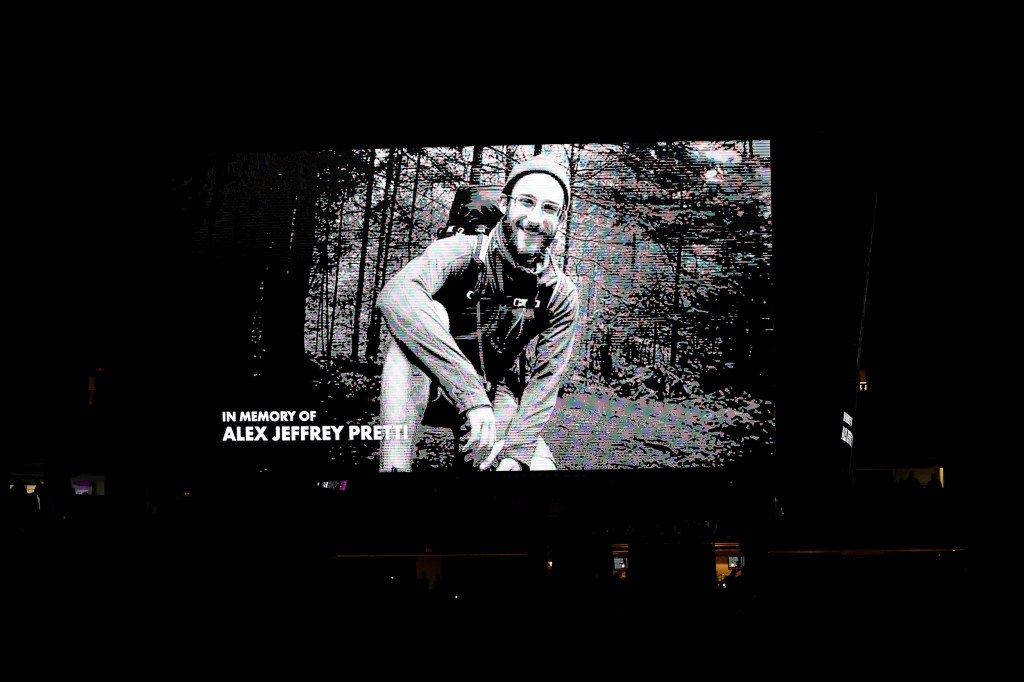 A photo of Alex Pretti is shown on a monitor.