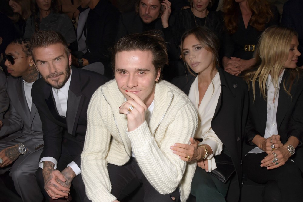 From left, David Beckham, Brooklyn Beckham and Victoria Beckham.