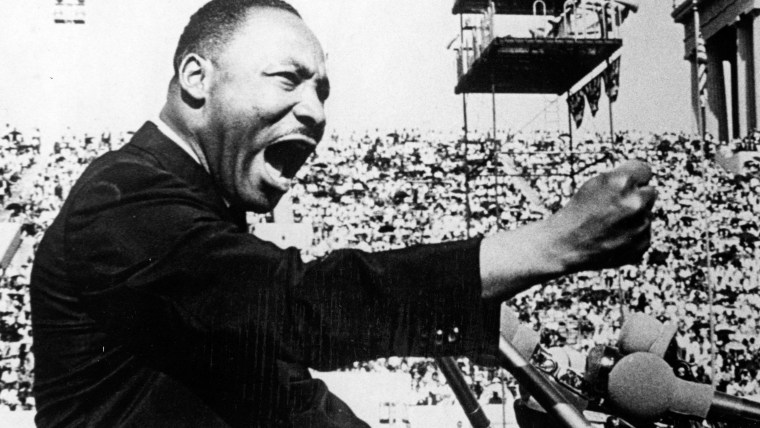 American civil rights and religious leader Dr. Martin Luther King Jr. (1929 - 1968) gestures emphatically during a speech at a Chicago Freedom Movement rally in Soldier Field, Chicago, Illinois, July 10, 1966.