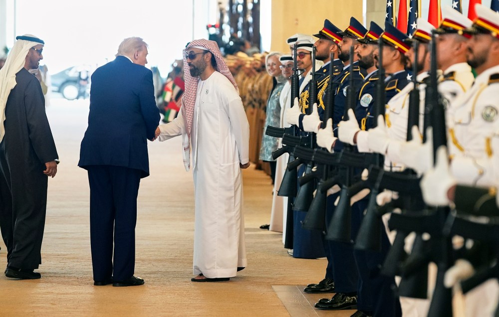 President Donald Trump shakes hands with Tahnoon bin Zayed Al Nahyan, national security adviser of UAE.