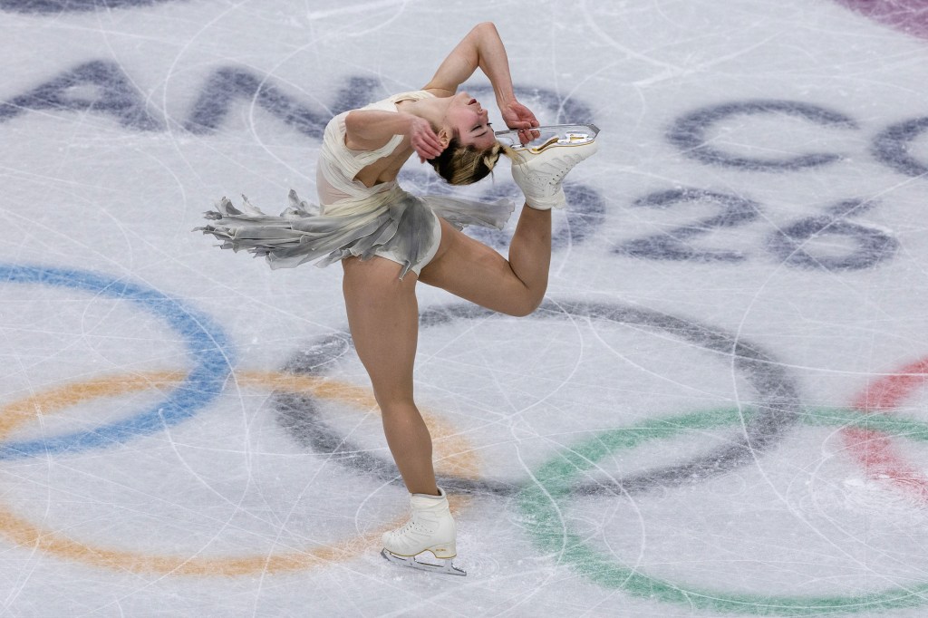 Alysa Liu performs an ice skating routine at the Winter Olympics.