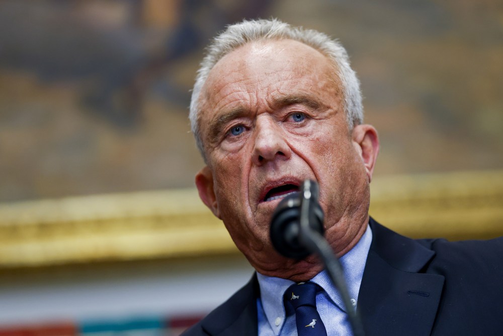 A close-up of Robert F. Kennedy Jr. speaking into a microphone.