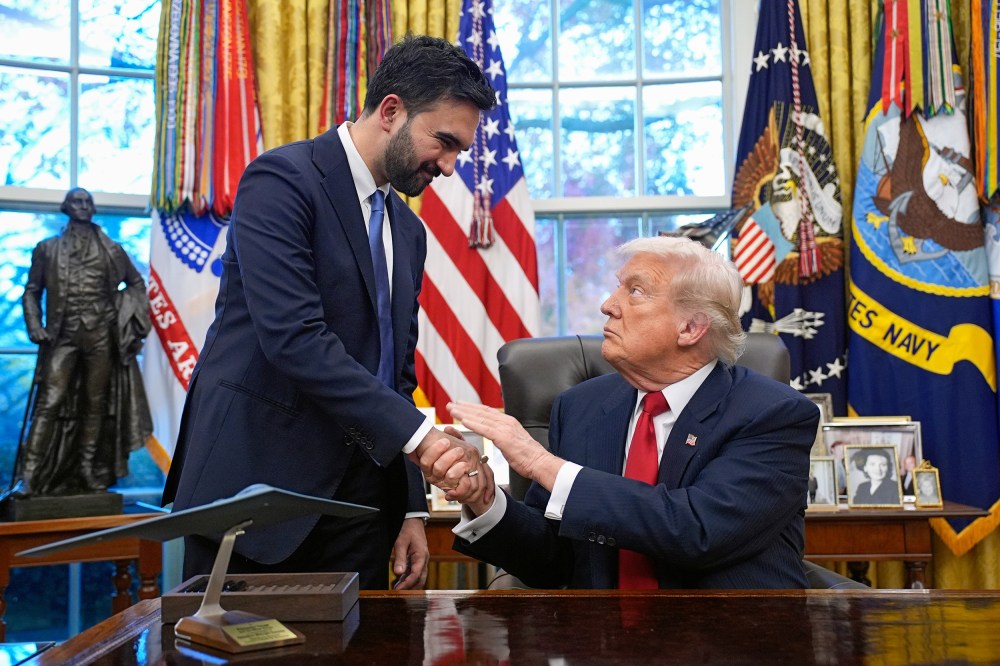 Zohran Mamdani, left, and Donald Trump shake hands in the Oval Office.