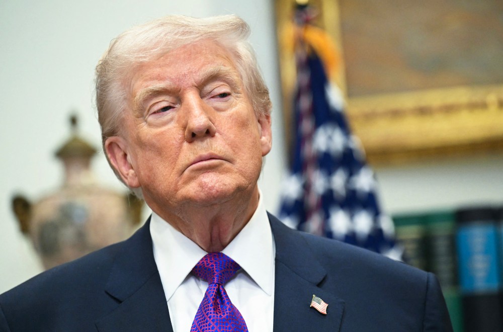 President Donald Trump looks on in the Roosevelt Room of the White House.