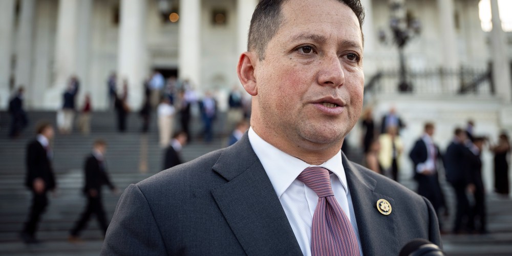 Tony Gonzales speaks into a microphone.