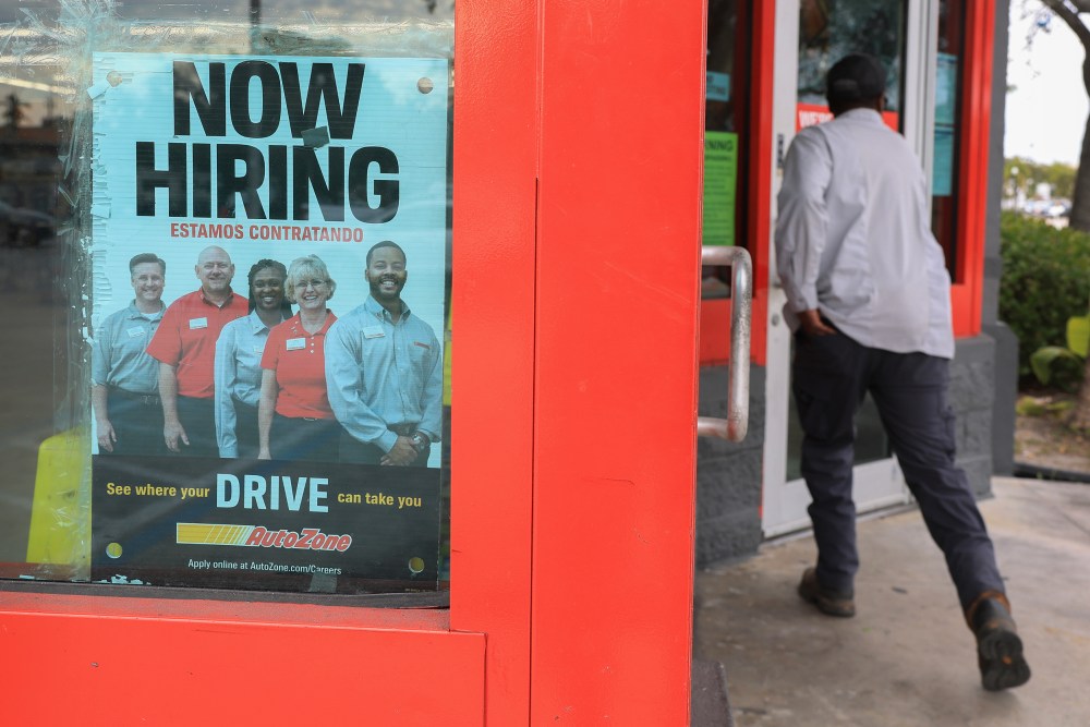 A man enters an AutoZone store.